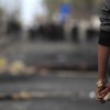 Ein Demonstrant in Port Said, Ägypten (Keystone/AP Photo/Khalil Hamra)