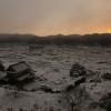 Verwüstete und schneebedeckte Landschaft in der Morgendämmerung, in Kesennuma, Nordostjapan, am zweiten Jahrestag des Tsunamis (AP Photo/Koji Ueda)