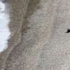 Eine Frau am Strand von Nizza, Frankreich (Keystone/AP Photo/Lionel Cironneau)