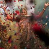Das farbenprächtige Holi Fest in Bangalore, Indien (Keystone/AP Photo/Kevin Frayer)