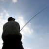 Angler an der Ostsee, Kiel (AP Photo/dpa,Carsten Rehder)