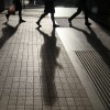 Schatten in einer Einkaufsstraße in Bangkok, Thailand  (AP Photo/Sakchai Lalit)