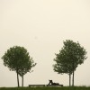 Pause auf der Bank in Hannover, Deutschland (Keystone/AP Photo/dpa, Sebastian Kahnert)